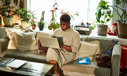 Woman at a couch working