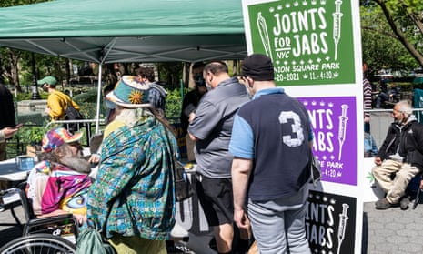 People celebrate legalization of recreational marijuana in New York state on 1 May. There was free distribution of joint for those who showed vaccination proof as well as signing up.