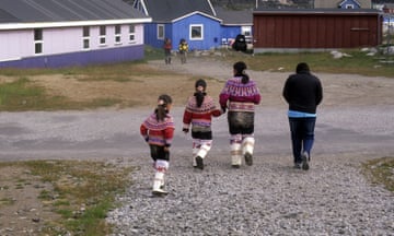 An Inuit mother and girls in traditional costume in Qeqertarsuaq, Greenland, in 2010.