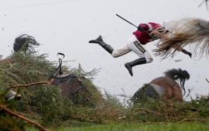 Nina Carberry flies off Sir Des Champs as they fall at The Chair fence during the Grand National steeplechase during day three of the Grand National Meeting at Aintree Racecourse