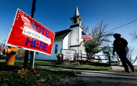 A local resident leaves a church after voting in the general election in Cumming, Iowa on 8 November 2016.