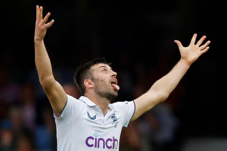 Mark Wood celebrates the wicket of Mitchell Starc in the final Test.