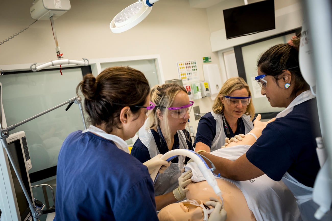 Royal Melbourne hospital intensive care unit nurses perform practice drills in readiness for Covid-19 patients.