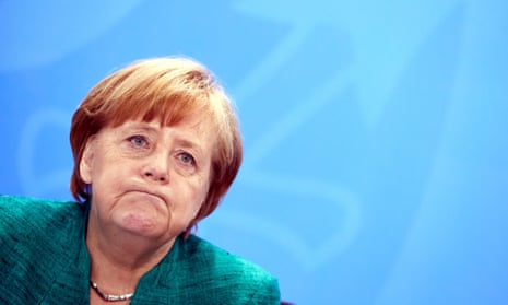 The German chancellor, Angela Merkel, looking unhappy