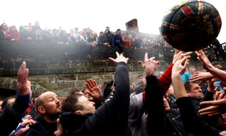 Thousands gather for annual Royal Shrovetide Football game – video