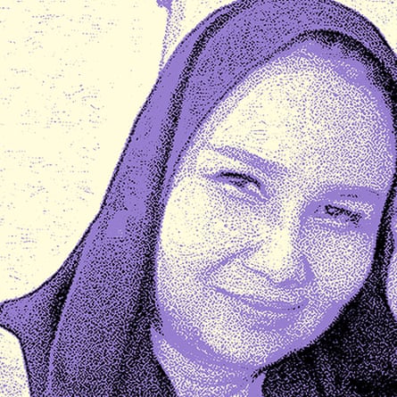 A photo of a smiling woman in a headscarf