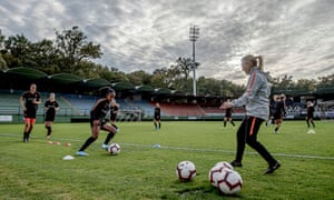 Sarina Wiegman puts Ashleigh Weerden through a drill during Netherlands training