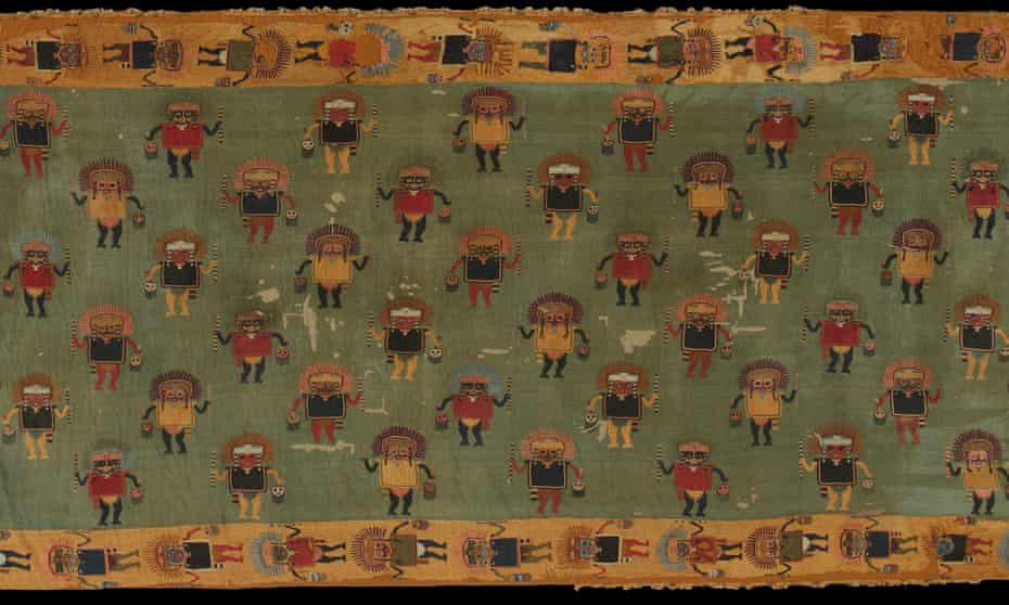 A detail from the 2,000-year-old funerary blanket showing human figures holding severed heads.