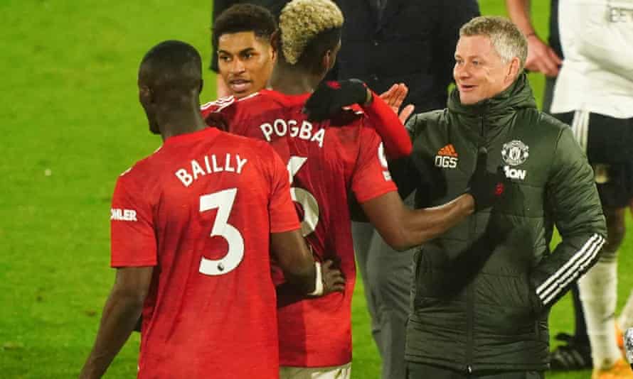 Manchester United’s Ole Gunnar Solskjær congratulates Paul Pogba after his decisive role in the win at Fulham.
