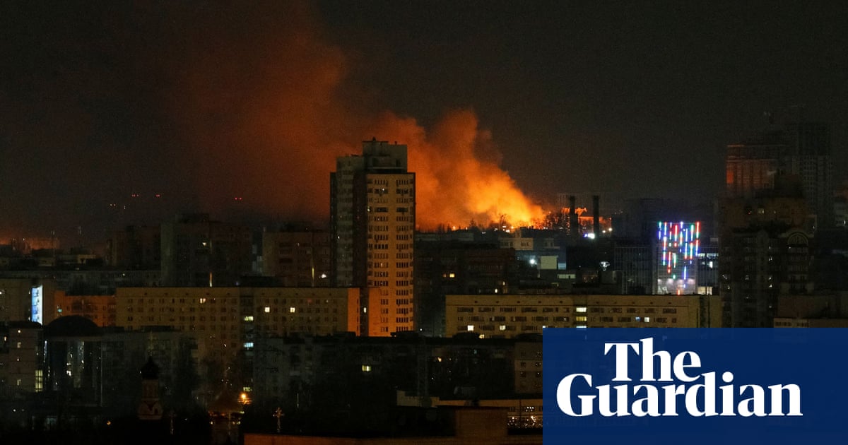 Explosions and gunfire across Kyiv during Russian night assault – video