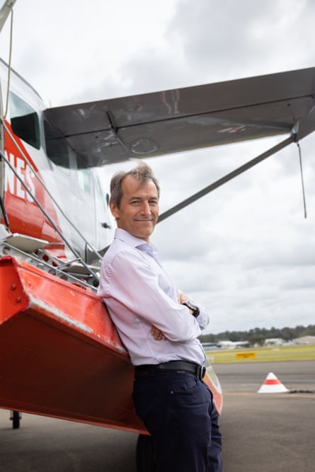 David Doral posing next to a plane