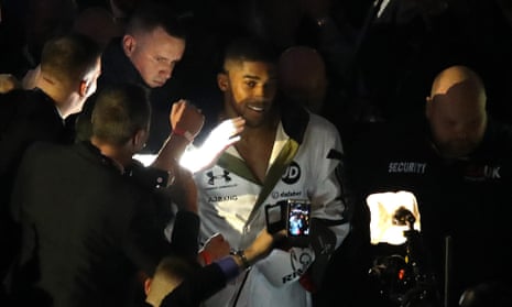 Anthony Joshua makes his way to the ring.