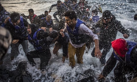Migrants arrive on Lesbos having made the crossing from Turkey