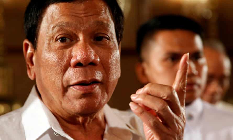Philippine President Rodrigo Duterte talks to reporters after a news conference at the presidential palace in Manila in March 2017.