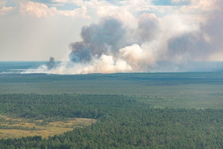 An aerial view of a wildfire in the taiga in the Khanty-Mansi Autonomous Area, in north-west Siberia. The boreal forests of Siberia are under attack from higher temperatures.