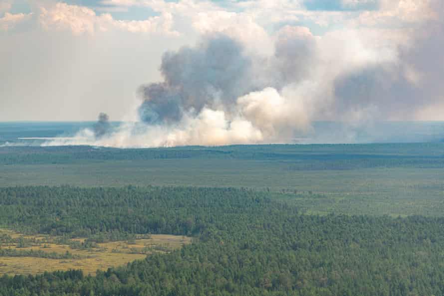 An aerial view of a wildfire in the taiga in the Khanty-Mansi Autonomous Area, in north-west Siberia. The boreal forests of Siberia are under attack from higher temperatures.