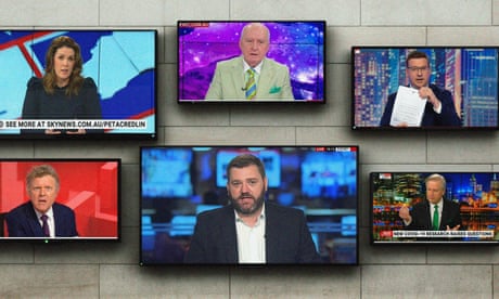 Flat screens hanging on a wall showing presenters from Sky News programs