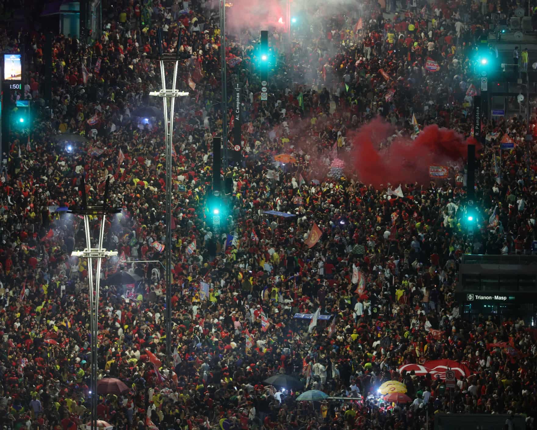 A big crowd of Lula supporters fill a street