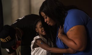 Roxie Washington embraces her daughter Gianna Floyd at a press conference on 2 June 2020 in St. Paul, Minnesota.