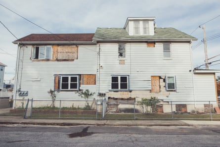 A house is boarded up five years after being devastated by Hurricane Sandy in the Midland neighborhood of Staten Island.