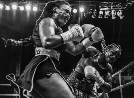 Claressa Shields (R) Punches Hanna Gabriels of Costa Rica (L) in the first round during their IBF and WBA world middleweight championship fight at the Masonic Temple Theater on June 22, 2018 in Detroit, Michigan