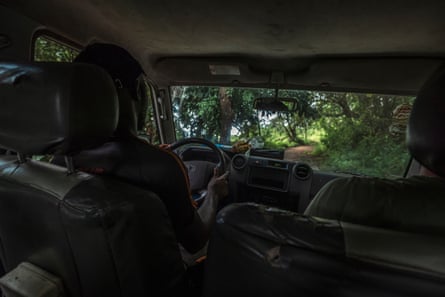 Workers from the Chimpanzee Conservation Centre driving