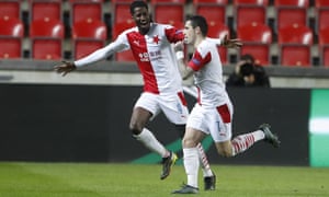 Slavia’s Nicolae Stanciu, right, celebrates scoring the opener.