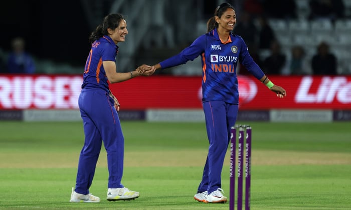 India's Renuka Singh Thakur (left) celebrates with captain Harmanpreet Kaur after claiming the wicket of England's Sophie Ecclestone.