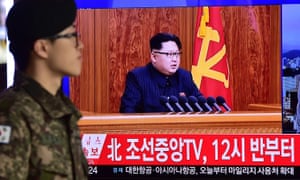 A television screen shows a broadcast of North Korean leader Kim Jong-Un’s New Year speech, in which he threatened war if provoked by outsiders.