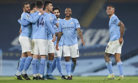 Gabriel Jesus of Manchester City celebrates scoring his teams fourth goal with team mates.