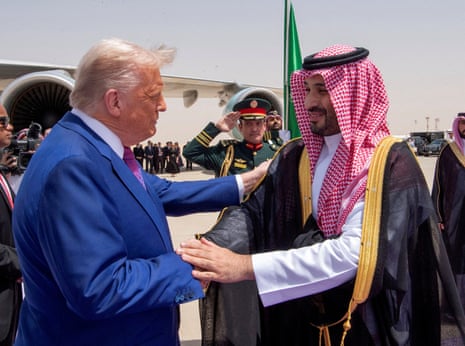 Donald Trump and Mohammed Bin Salman shake hands at a welcoming ceremony in Riyadh on 13 May.