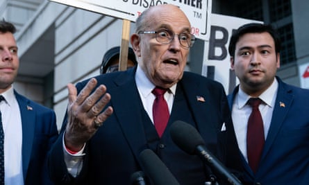 Rudy Giuliani gestures as he speaks