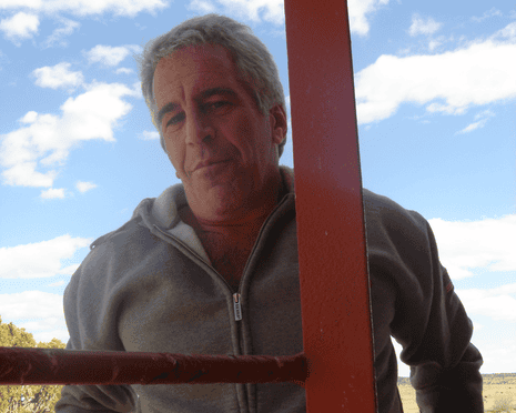 man in gray sweatshirt smiling