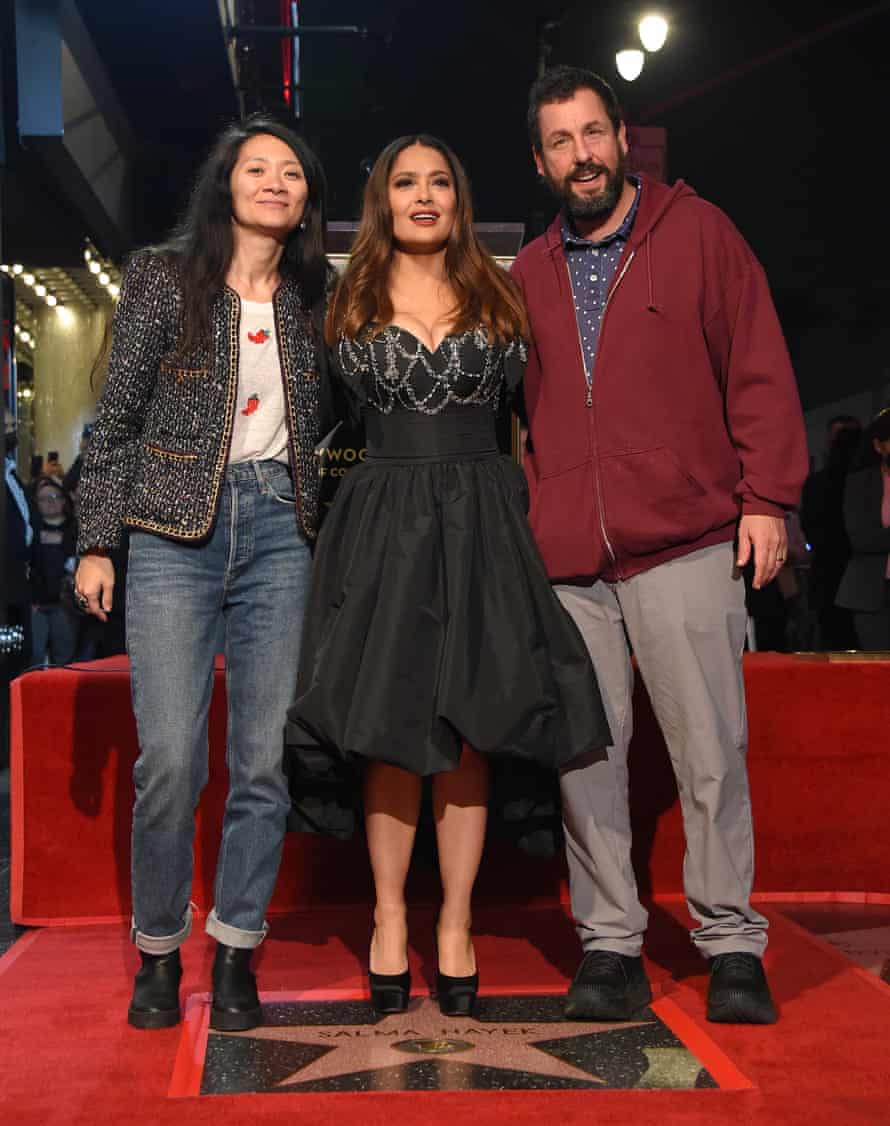 Sandler with Chloé Zhao and Salma Hayek Pinault on the Hollywood Walk of Fame, Los Angeles.
