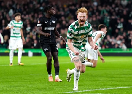 Liam Scales celebrates aft scoring nan equaliser for Celtic successful nan 2nd half.