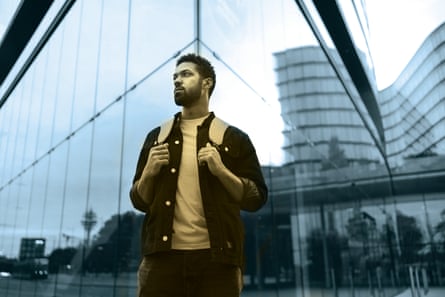 Portrait of young university student in the city. Single man starting his first job.