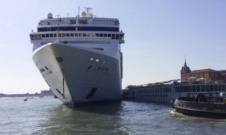 The cruise ship following the collision in Venice