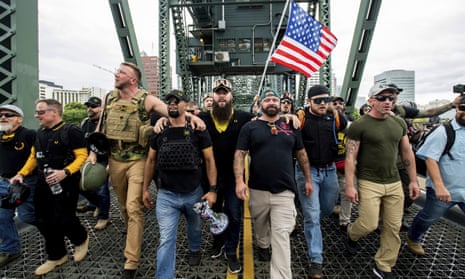 Members of the Proud Boys and other far-right demonstrators march in Portland, Oregon, August 2019