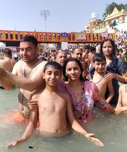 Family of Thakur Puran Singh in the Ganges during Kumbh