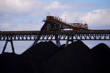 Coal is unloaded onto large piles at the Ulan Coal mines near the central New South Wales rural town of Mudgee, Australia