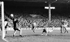 Colin Bell (on ground) scores for Manchester City against Ipswich Town at Maine Road in October 1975. The following month Bell sustained a serious knee injury following a tackle by Manchester United’s Martin Buchan in a League Cup win