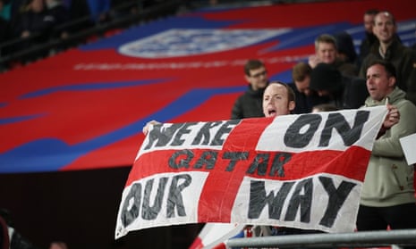 England fan holds up a flag inside the stadium.