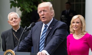 President Donald Trump with Cardinal Donald Wuerl and Pastor Paula White