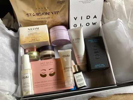 One of Jenny’s many unused beauty boxes, with products including a ‘happiness scented candle’ and a ‘positivity bath and shower gel’.