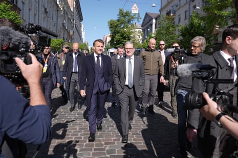 Keir Starmer (centre right) with Emmanuel Macron (centre left) in Kyiv.