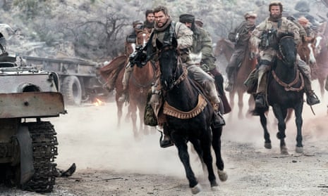 Blazing saddless: Chris Hemsworth rides into battle in 12 Strong.