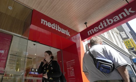 People walk past a Medibank branch in Sydney