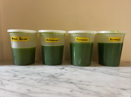 containers of green juices on a countertop