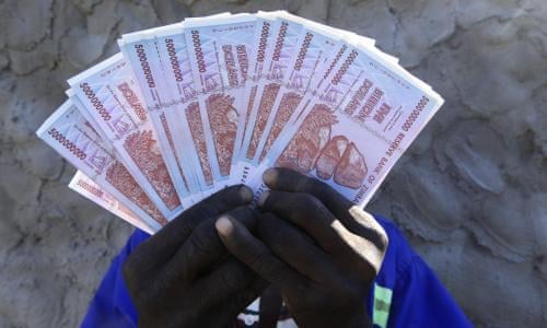Zimbabwe Offers New Exchange Rate 1 For 35 000 000 000 000 000 Old Dollars World News The Guardian