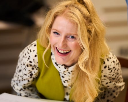 MP Hannah Spencer in green waistcoat and white shirt with black spots
